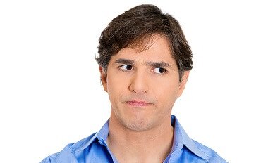 unhappy young man in blue shirt